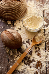 Canvas Print - Bread and flour on the table