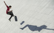 © DAVID AGUERO/ADDICTIVE STOCK - Teenager with a skateboard in the street
