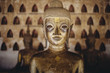 © Gavin Gough - One of the many, ancient Buddha statues