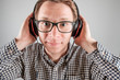 © Iurii - Man listening to music