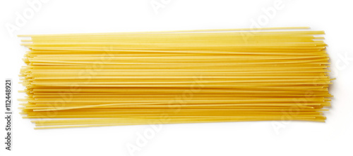 Cuadros en Lienzo Spaghetti pasta isolated on white, from above