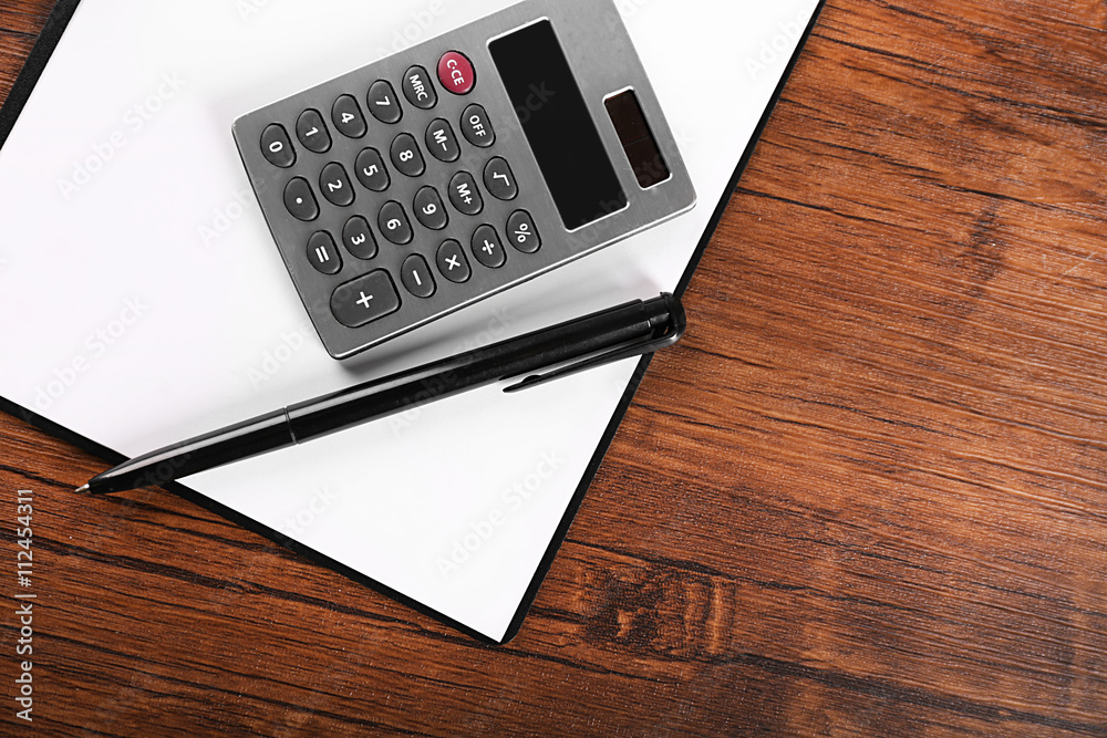 Office supply on wooden background