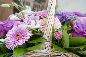 Beautiful bouquet of flowers with a pink gerberа. Focus in the center of the image, the image is slightly blurry edges