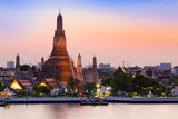 Fototapeta Koty - Arun Temple river front, Thailand Landmark, the most famous tourist destination in Bangkok Thailand