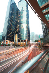 Wall Mural - HongKong of road light trails on streetscape buildings in