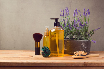 Body care products on wooden table