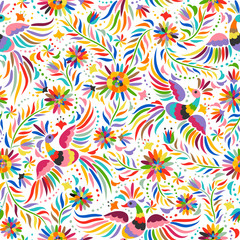 Mexican embroidery seamless pattern. Colorful and ornate ethnic pattern. Birds and flowers light background. Floral background with bright ethnic ornament.