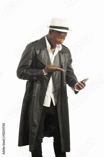 Young african american man using a mobile phone Poster