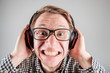 © Iurii - Man listening to music