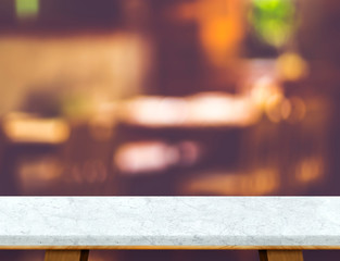 Aufkleber - Empty white marble table and blurred cafe bokeh light background