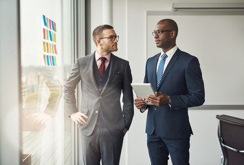 Canvas Print - Two smart business managers in a discussion