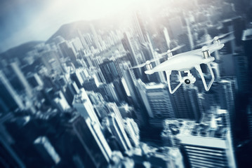 Wall Mural - photo white matte generic design remote control air drone with action camera flying sky under city. 
