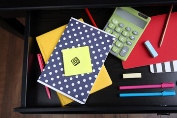 Sticker - Stationery in open desk drawer, top view