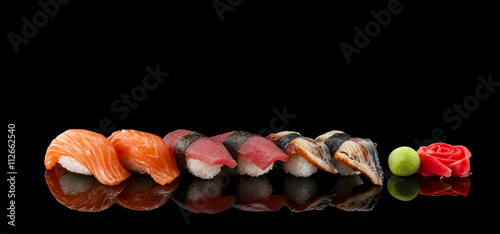 Cuadros en Lienzo Sushi nigiri set over black background