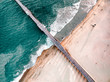 © Ryan Longnecker - Aerial drone view of pier on coastline