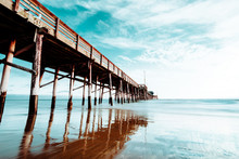 Low Angle View Of Pier In Ocean