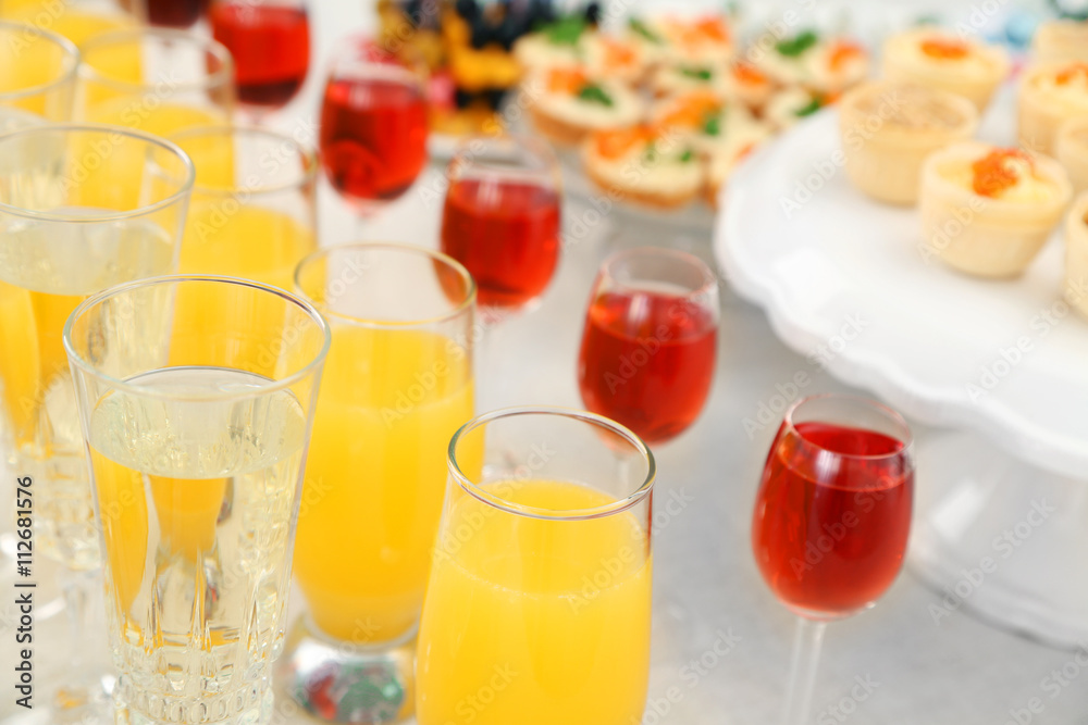 Set of cold snacks, canape, beverages, closeup