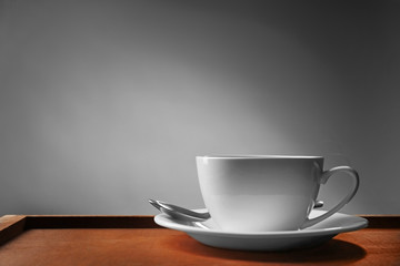 Wall Mural - Cup of tea on wooden table