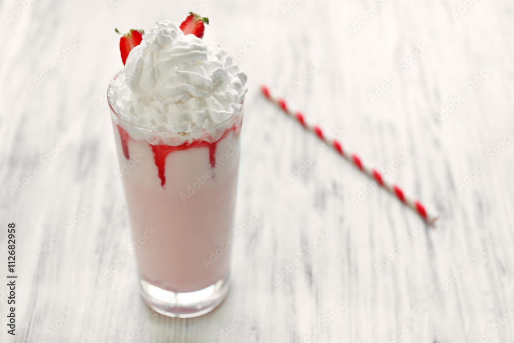 Fresh milk cocktail on wooden background