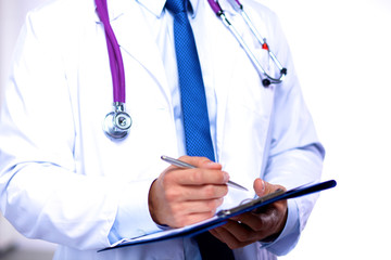 healthcare and medicine concept - serious male doctor with stethoscope