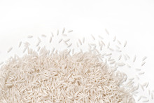 Close Up Of White Rice  On White Background. Top View, High Resolution Product.