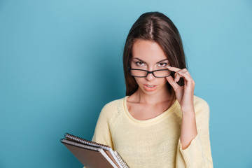 Sticker - Portrait of smart pensive girl in glasses thinking about something