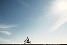 Girl Enjoying Bike Ride Silhouette