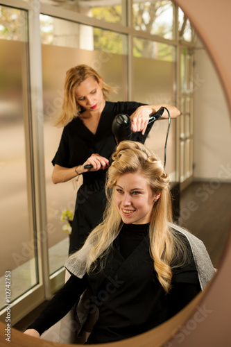 Professional Hair Stylist At Work Hairdresser Doing Hairstyle