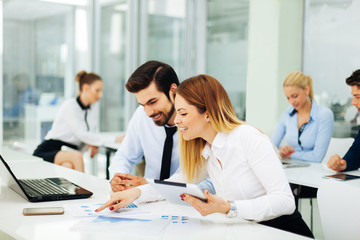 Wall Mural - Young business people working together