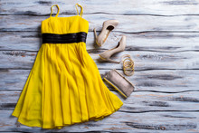Yellow Dress, Purse And Shoes. Casual Yellow Dress With Accessories. Lady's Charming Summer Outfit. New Clothes And Heel Shoes.