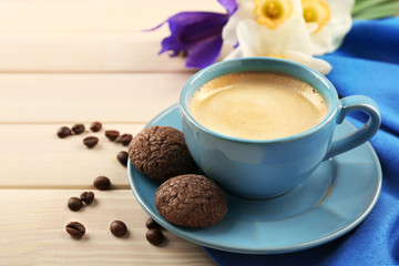 Poster - Cup of coffee with cookies and flowers on wooden table