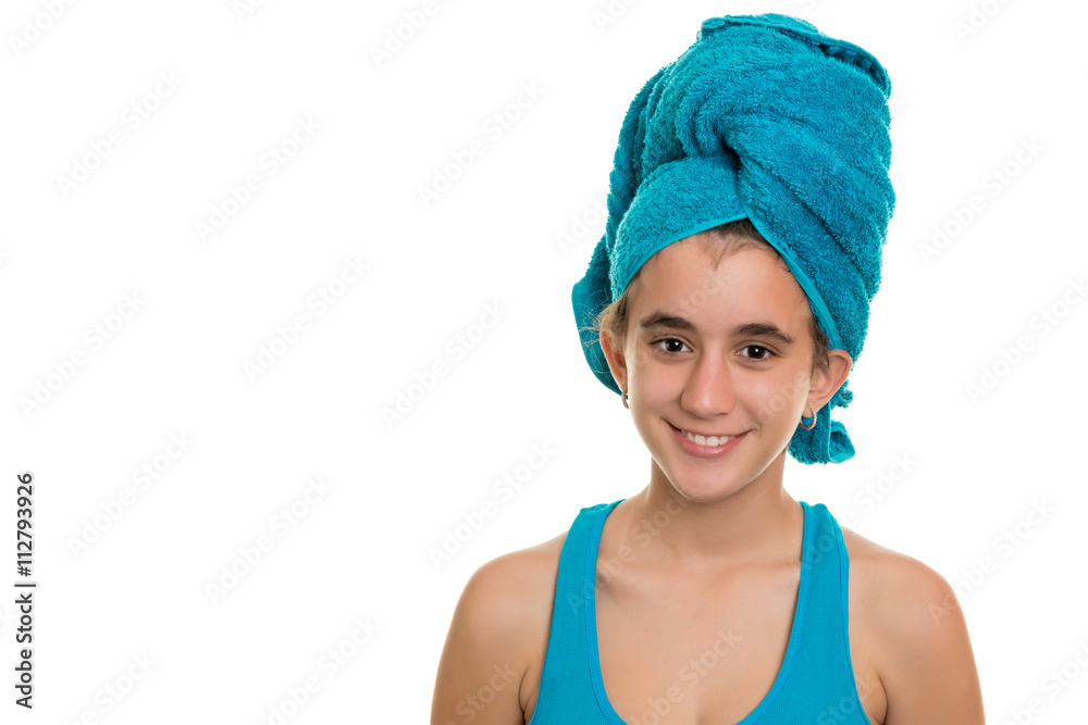 Teenage girl with a blue towel wrapped over her wet hair Stock Photo ...