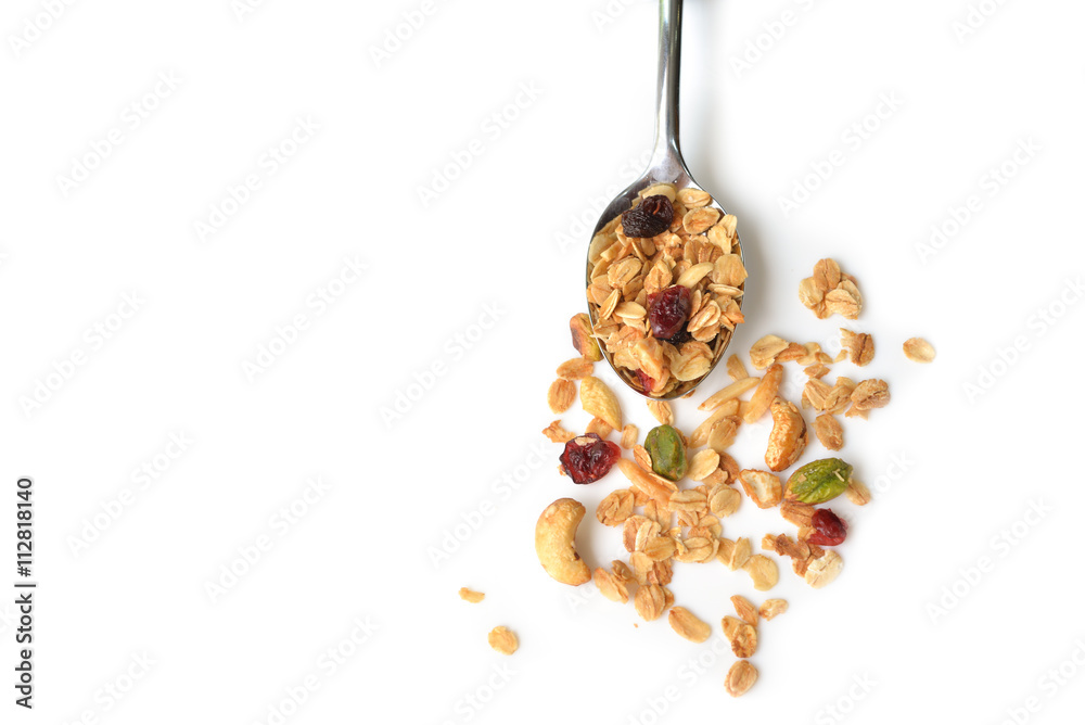 Homemade granola with honey, oatmeal, cashew nut, almond, pistachio, raisin and cranberry on white background - obrazy, fototapety, plakaty 