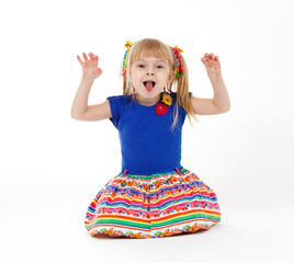 Funny little blond child with two tails imitating kitten