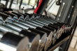 © themorningglory - Selective focus on Dumbbell in fitness and gym room