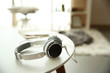 © Africa Studio - New headphones on the table in the room