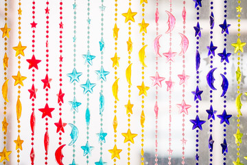 Stars and Moon curtain made from plastic beads