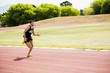 © WavebreakMediaMicro - Athlete running on the racing track