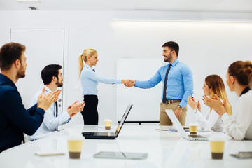 Wall Mural - Business people shaking hands after a successful agreement