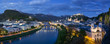 Austria, Salzburg, panoramic view of Salzach river, old town and castle Hohensalzburg, blue hour