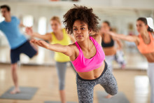 Close Up Of Young Woman On Stretching Training Indoor