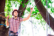 © davit85 - adventure climbing high wire park - people on course in mountain