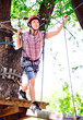 © davit85 - adventure climbing high wire park - people on course in mountain