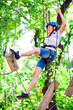 © davit85 - adventure climbing high wire park - people on course in mountain