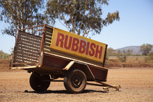A Vehicle Trailer With The Word Rubbish On It
