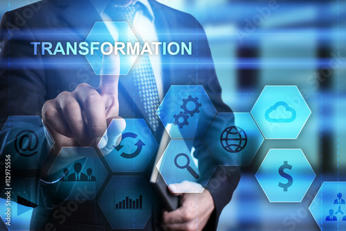 Fotografía Businessman is pressing button on virtual screen and selecting Transformation