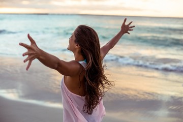 woman stretching out her arms