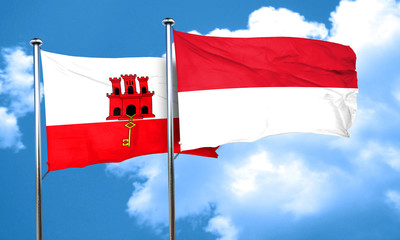 gibraltar flag with Indonesia flag, 3D rendering