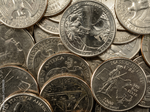 Fotografia, Obraz United States Coins quarters in a pile thrift savings