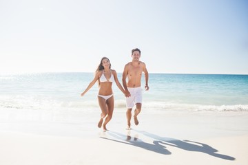  Couple having fun at the beach